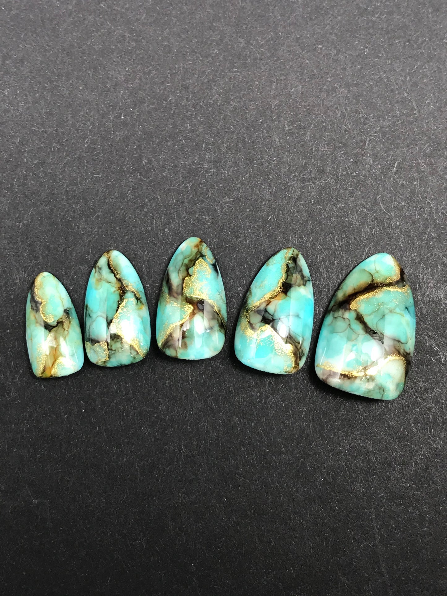 Turquoise Marble Nails